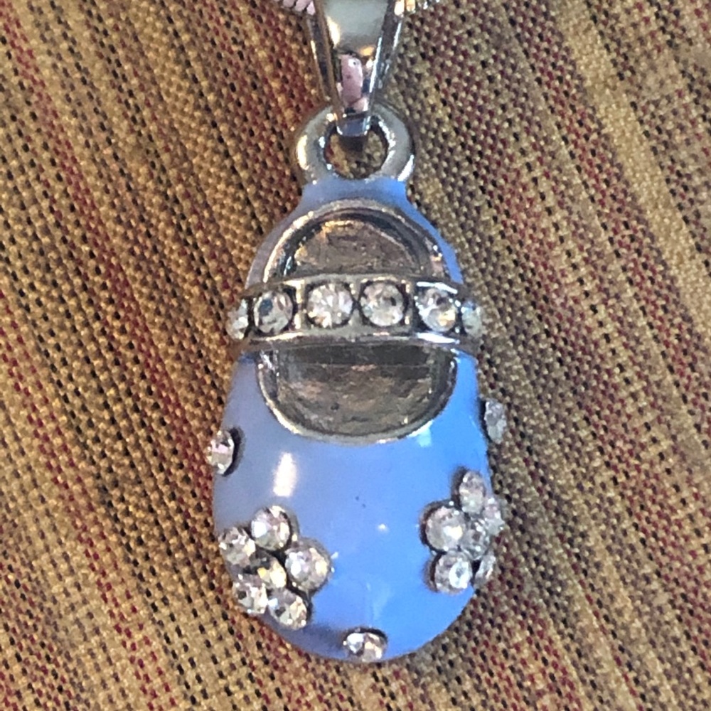 Baby shoe rhodium plated necklace 16”
